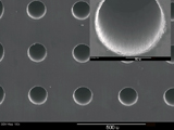 Laser drilled holes in silicon